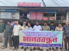 বাবুরহাট হাজী মোবারক মার্কেটের সামনে অবৈধ স্থাপনার নির্মাণ ঠেকাতে ব্যবসায়ীদের মানববন্ধন